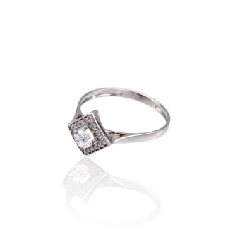 ANILLO ORO BLANCO 18 KILATES MUJER FORMA DE ROMBO CON CIRCONITAS BLANCAS DE 1 MILÍMETRO Y UNA CIRCONITA BLANCA CENTRAL DE 4 MILÍ