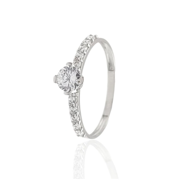 ANILLO ESTILO SOLITARIO MUJER ORO BLANCO 18 KILATES PIEDRA BLANCA 5 MILÍMETROS CUATRO GARRAS CON CIRCONITAS BLANCAS EN EL BRAZO